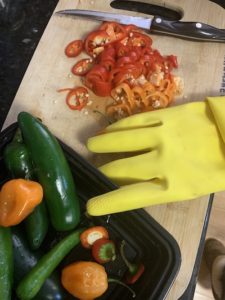 Chopping four different types of peppers - use a glove!